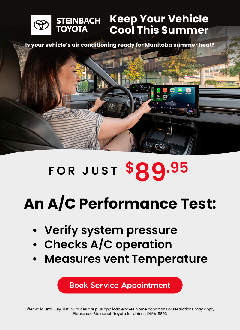 Woman driving a Toyota car with touchscreen display, promoting Steinbach Toyota A/C performance test for $89.95 to keep vehicles cool in Manitoba summer.